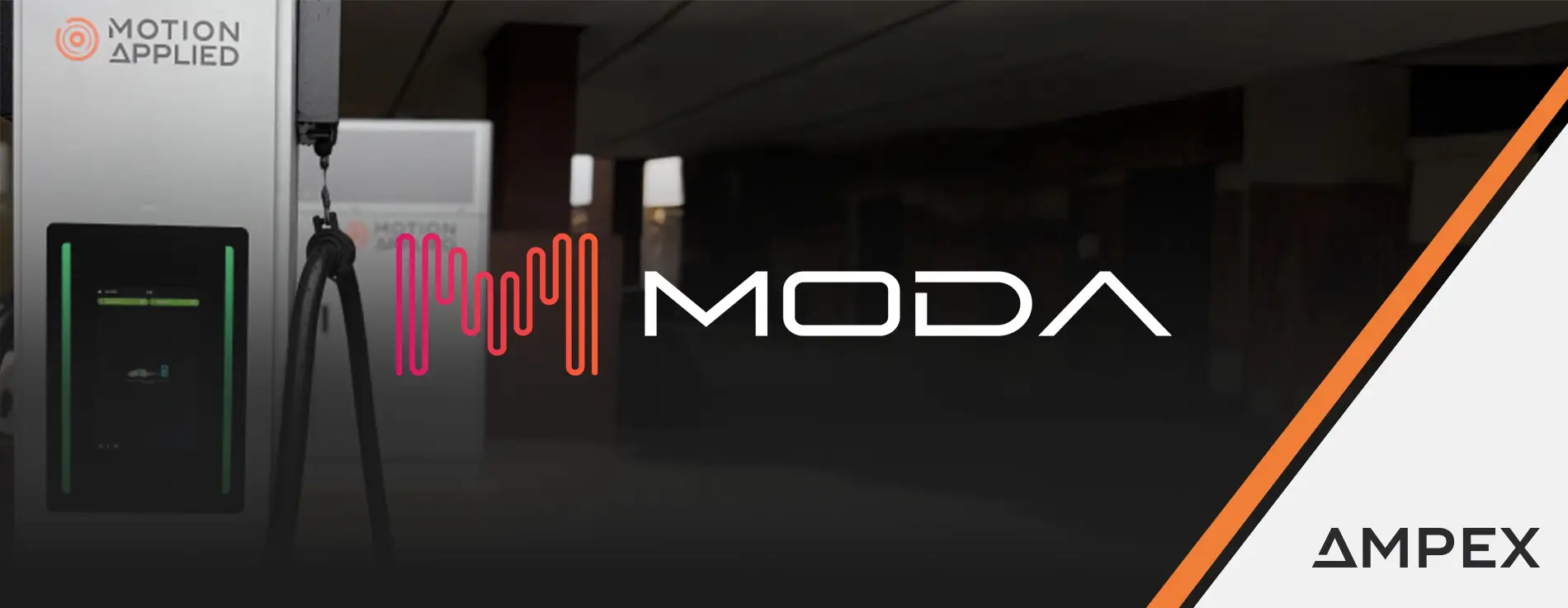 A sleek black electric car parked next to a white ultra-rapid EV charging station branded with “MODA” and “Motion Applied.” The charger has a digital display and pink cable graphics at the bottom. The setting is an urban area with a brick wall and modern office building in the background.