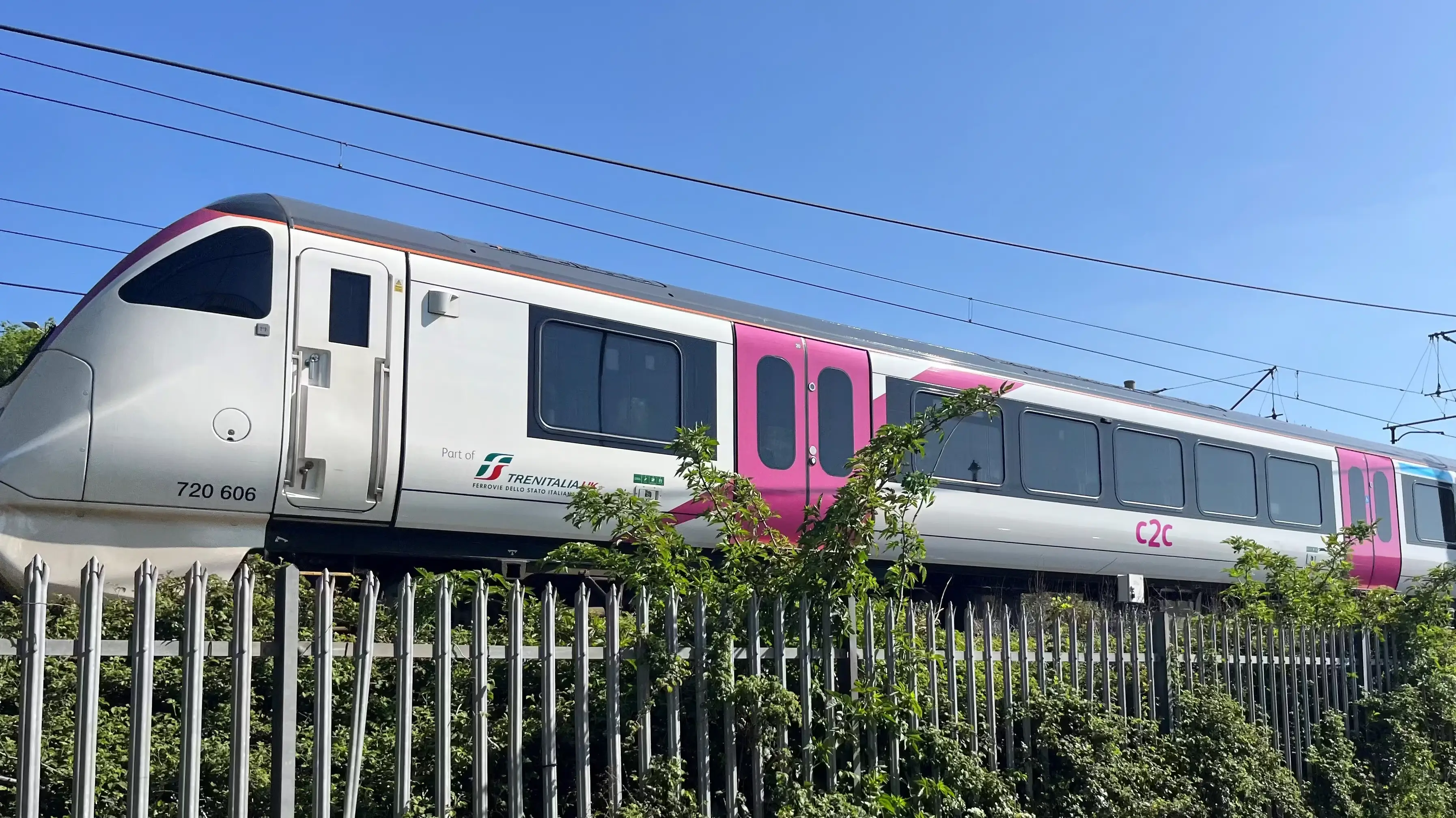 Two logos on a white background separated by a thin vertical line: “McLaren Applied” in black on the left and “Network Rail” in blue with orange diagonal stripes on the right. Below the logos, the text reads “Driving increased data offload with 5G technology.”